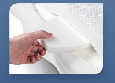 Sleep Enhancing Cervical Support Goose Down Pillow on bed