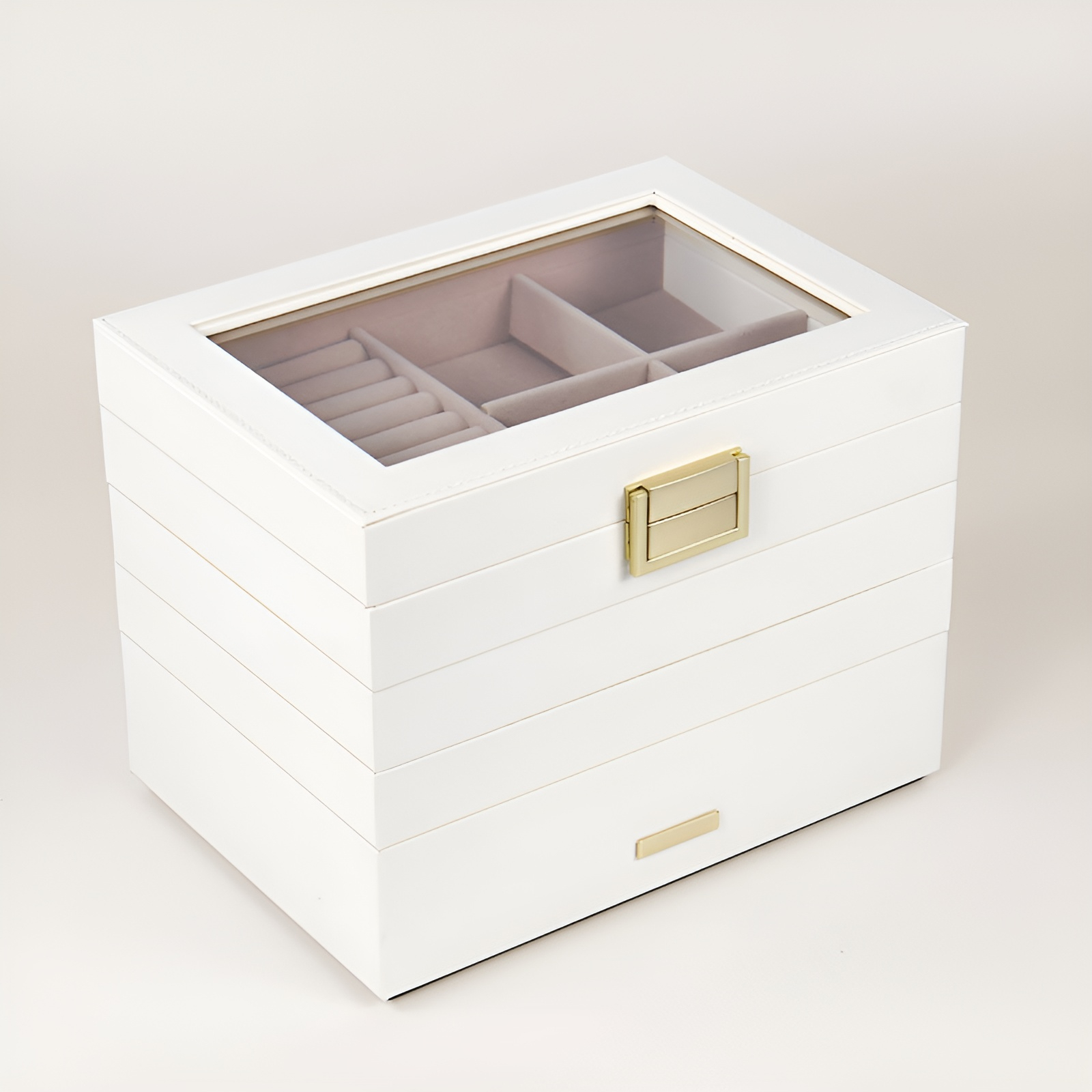 Jewelry storage box organizing rings, necklaces, and watches