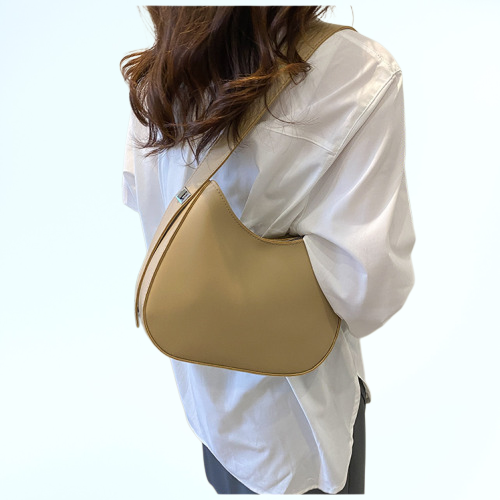 กระเป๋าผู้หญิงพื้นผิวอ่อนนุ่มแบบเรียบง่ายและทันสมัยในเมือง