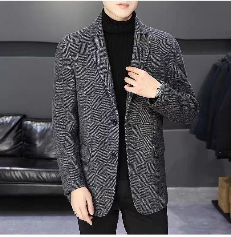 남성용 헤링본 정장 자켓 단추 클로즈업