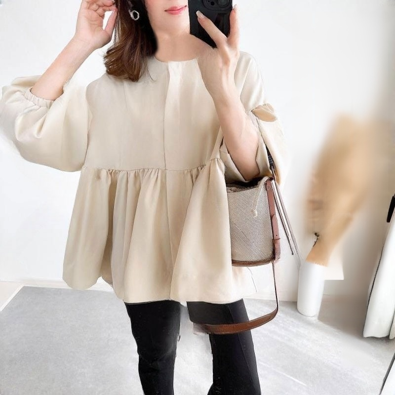 ゆったりデザインのレディースシャツ