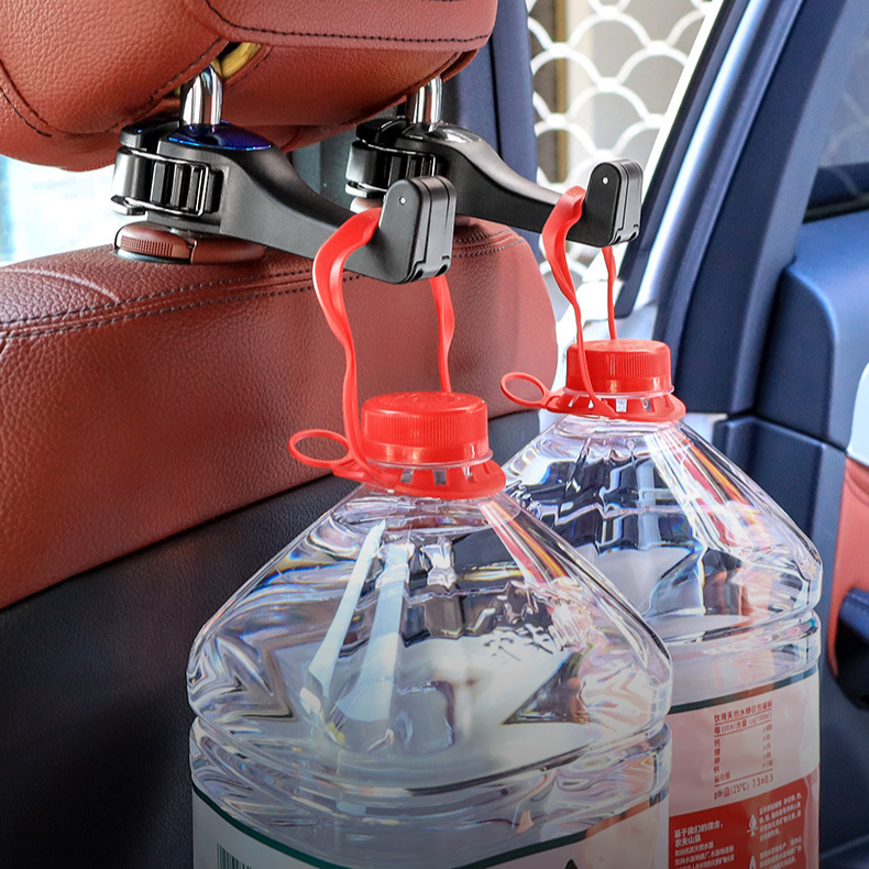 車の内部の後部座席は回転多機能車のホックの携帯電話のホールダーの座席背部クリップを引っ掛けます