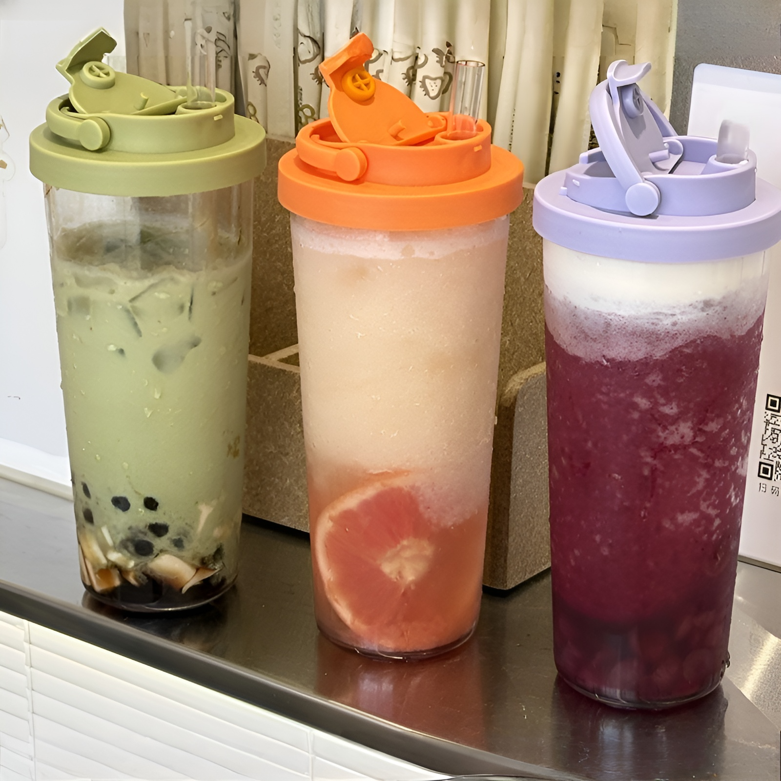 パールミルクティーカップ、ポータブルハンドルウォーターボトル、伸縮式ストローウォーターカップを吸うための大きな穴を備えた新しい単層Tritanストローカップ