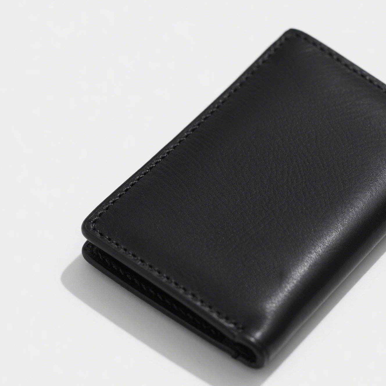 Elegantní černé kožené pouzdro na peníze