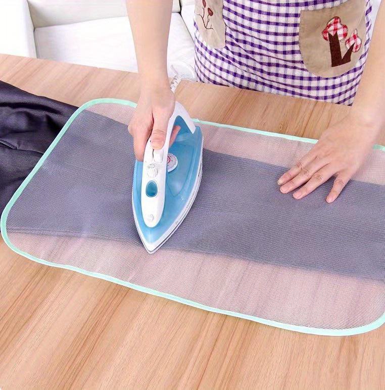 Close-up of heat shield ironing cloth protector