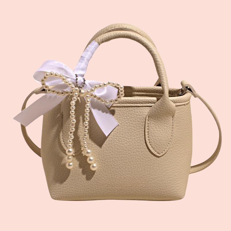 กระเป๋าถือผู้หญิงทรงถัง สีพื้น สไตล์มินิมอล 2025