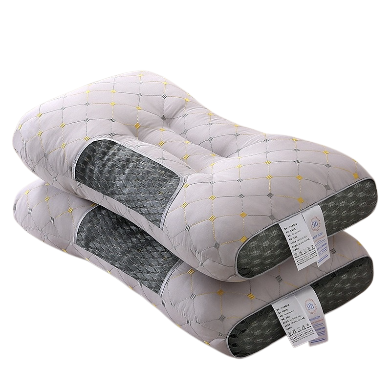 Fluffy breathable massage pillow on a bed