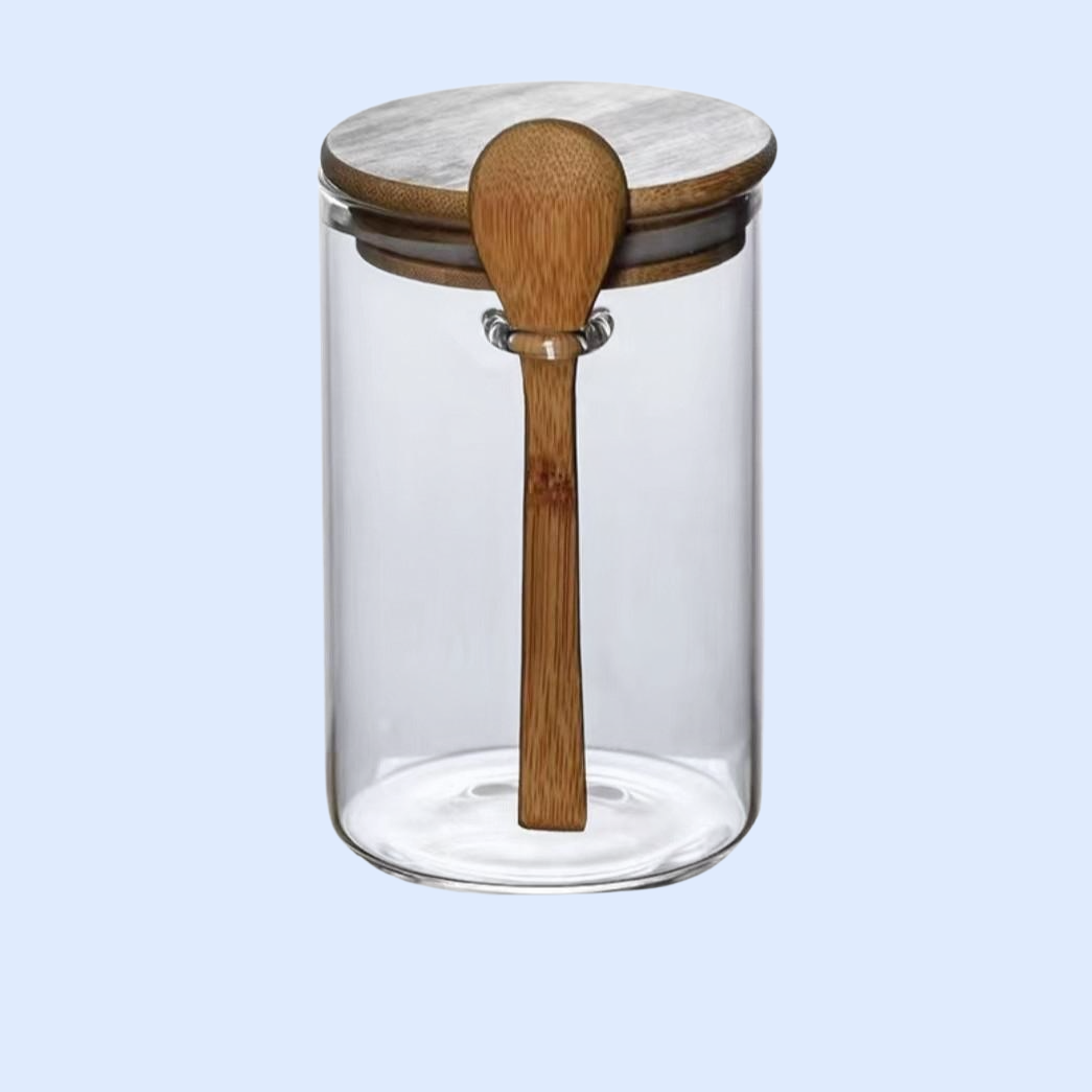 ขวดแก้วฝาปิดพร้อมช้อนไม้สำหรับเก็บธัญพืชและผลไม้อบแห้งในครัว