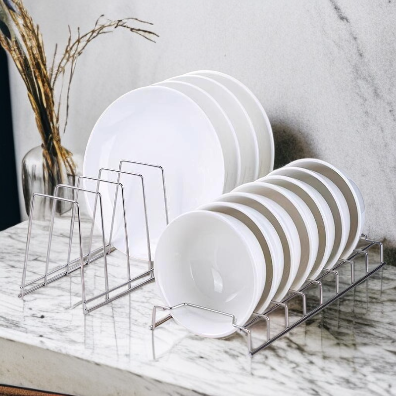 Stainless steel dish drain rack on kitchen countertop