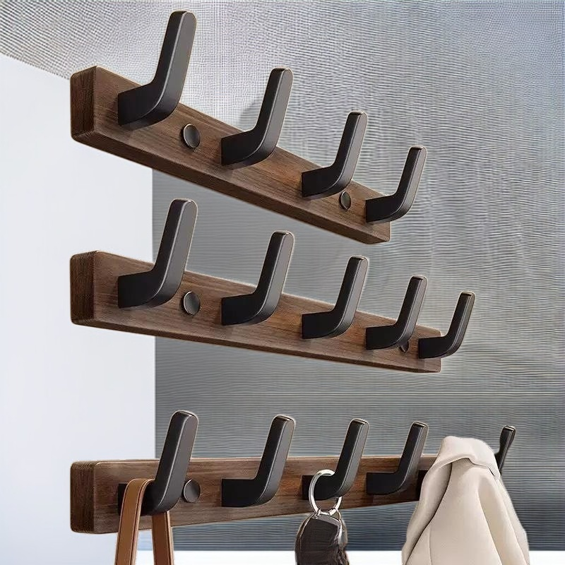 Punch-free clothes hanger behind the entrance door