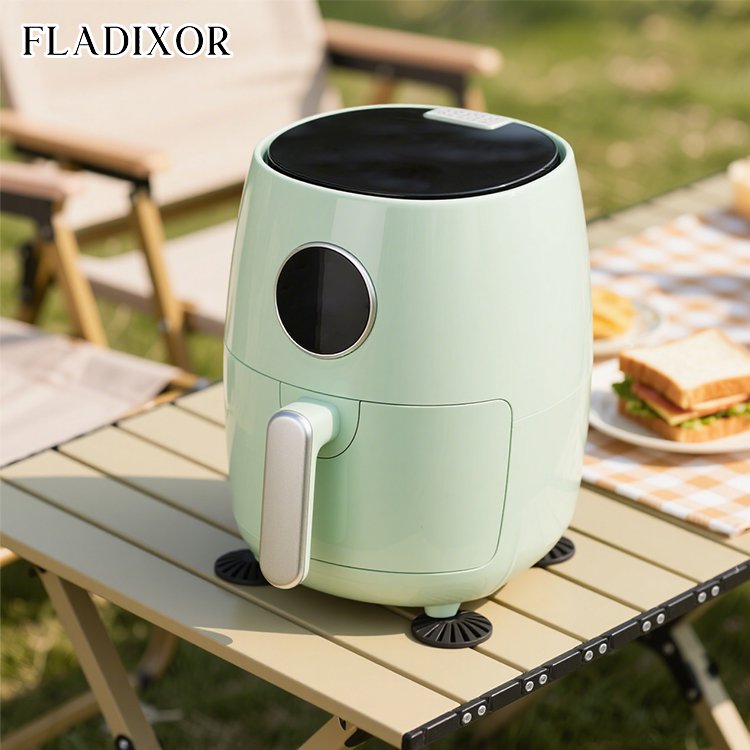 Vista superior de freidora de aire con alimentos saludables