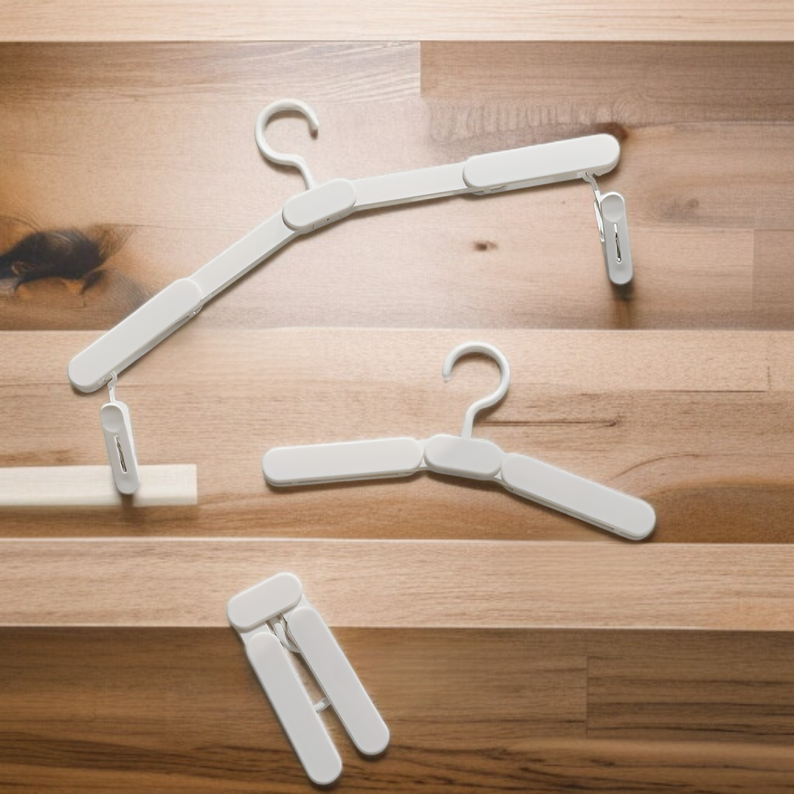 Percha de ropa portátil plegable sin costuras