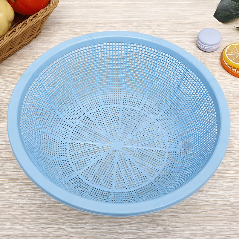 Canasta redonda de frutas y verduras