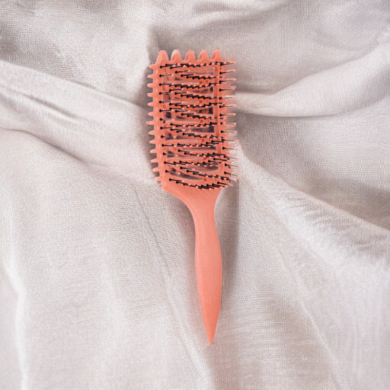 伸縮性のあるコーム