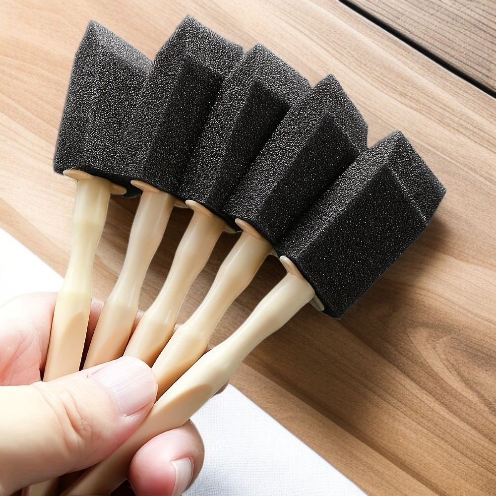 Car care brush removing dirt from seats