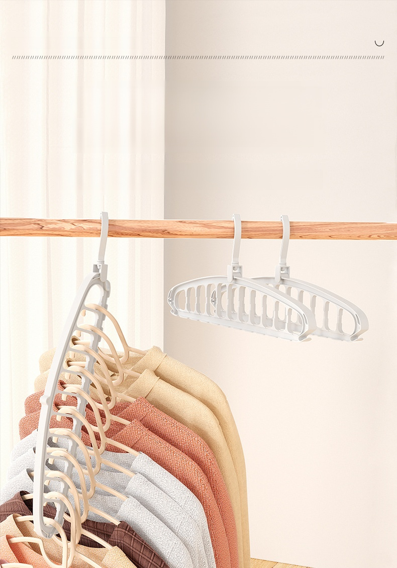 Perchero plegable de 9 agujeros para ropa colgado en la pared