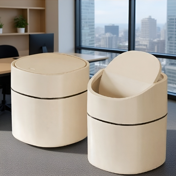 Stylish modern flip-top trash can in living room