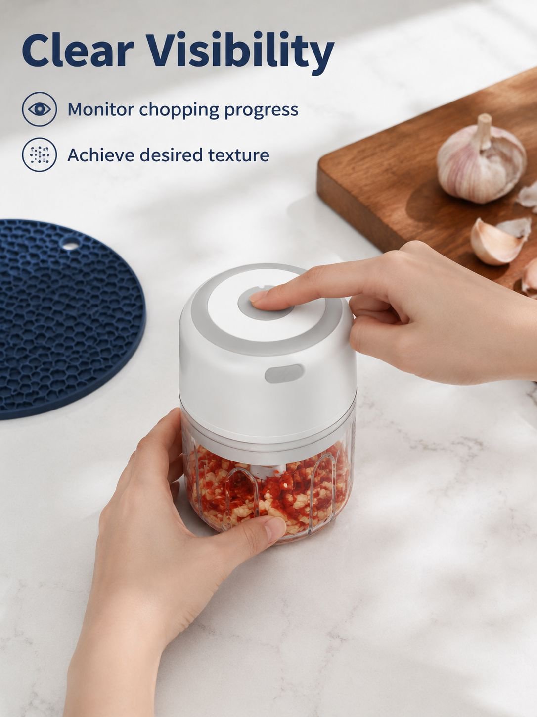 Electric food chopper processing onions and peppers