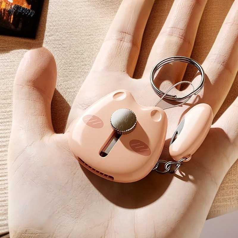 سلسلة مفاتيح مقشرة الفاكهة