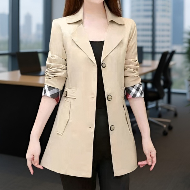 シンプルな女性の薄いコート、スタイリッシュでスリム