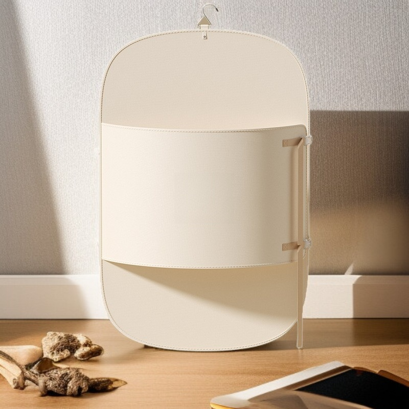 옷걸이 수납용 압축판