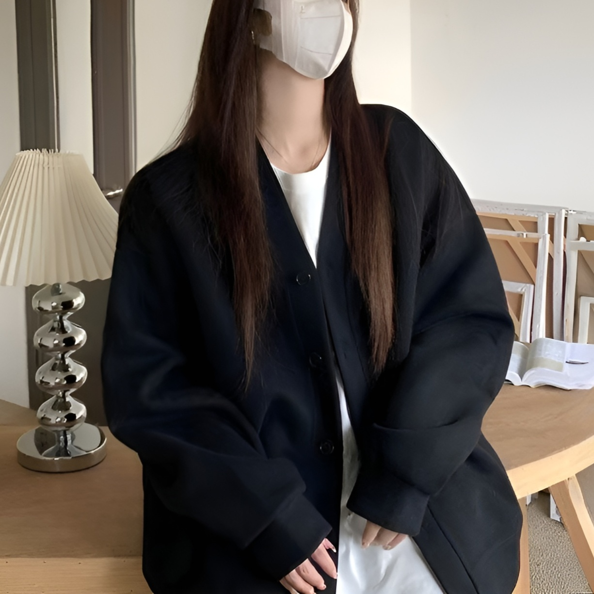 ゆったりシルエットのレディースアウター袖部分