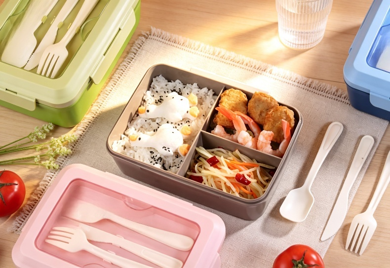 Microwave safe lunch box filled with balanced meal