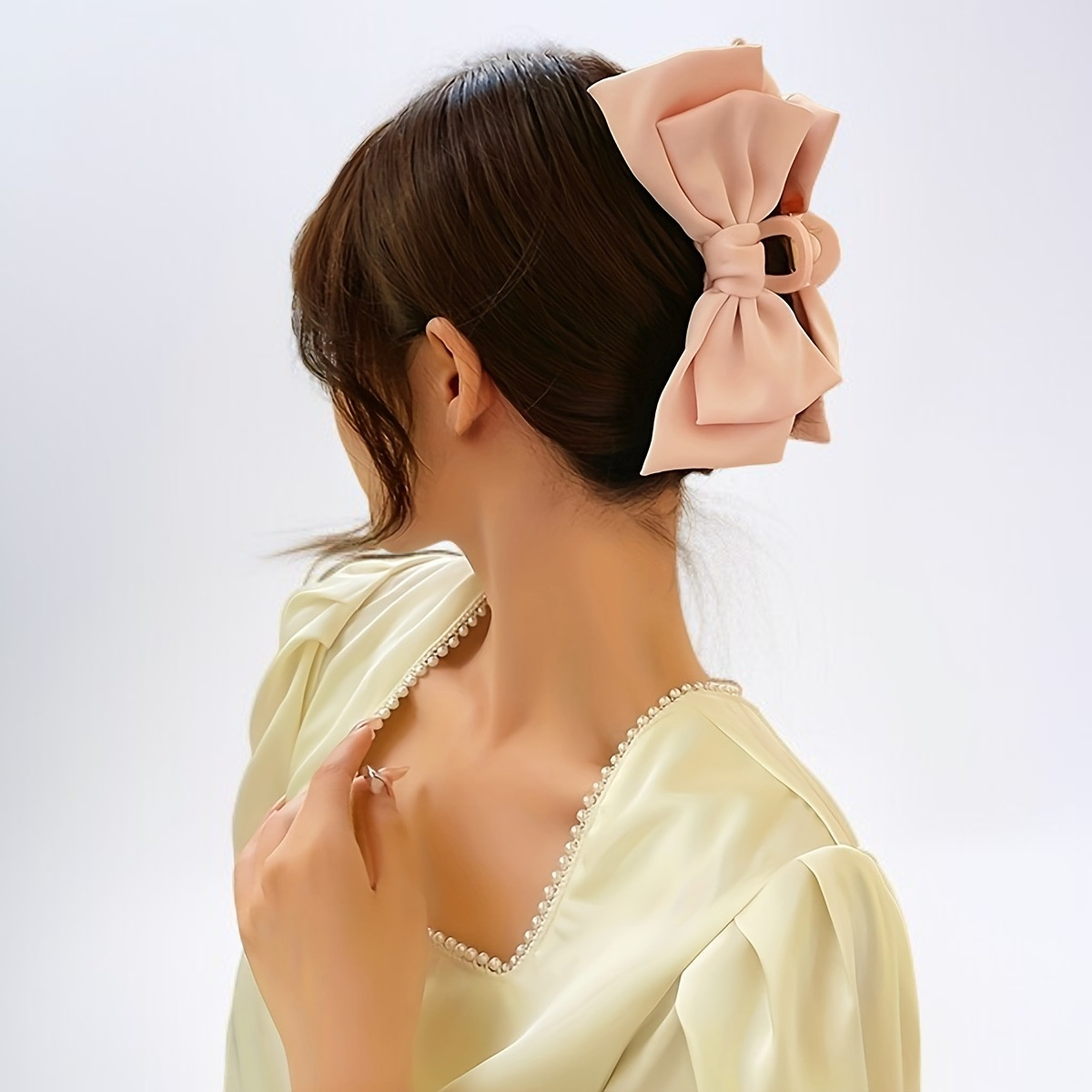 Clip de garra en forma de arco