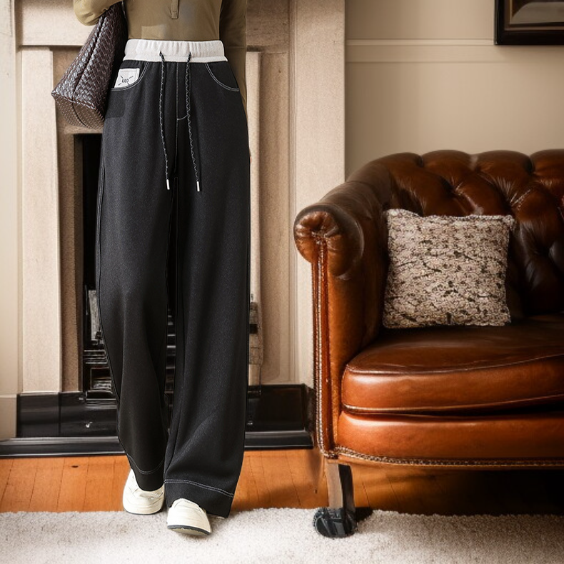 Model wearing wide slim straight fit denim pants