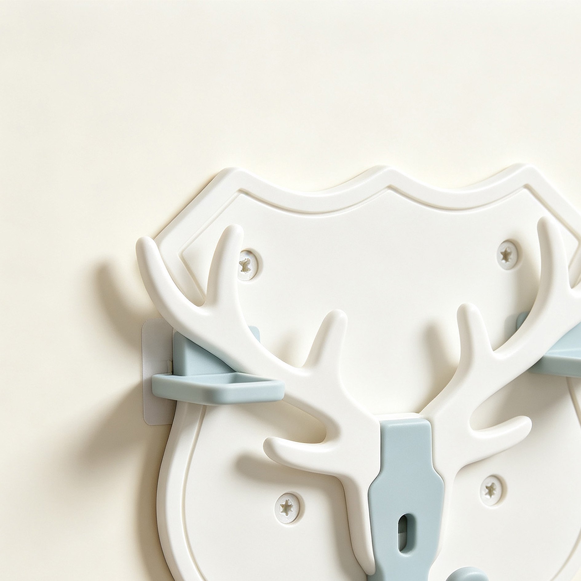 Antler Shield Hook wall mounted on wooden wall