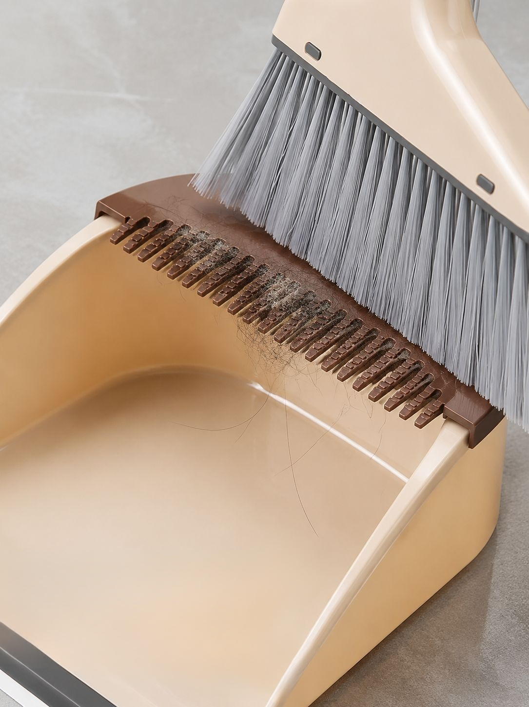 Magic broom easily sweeps hair and debris