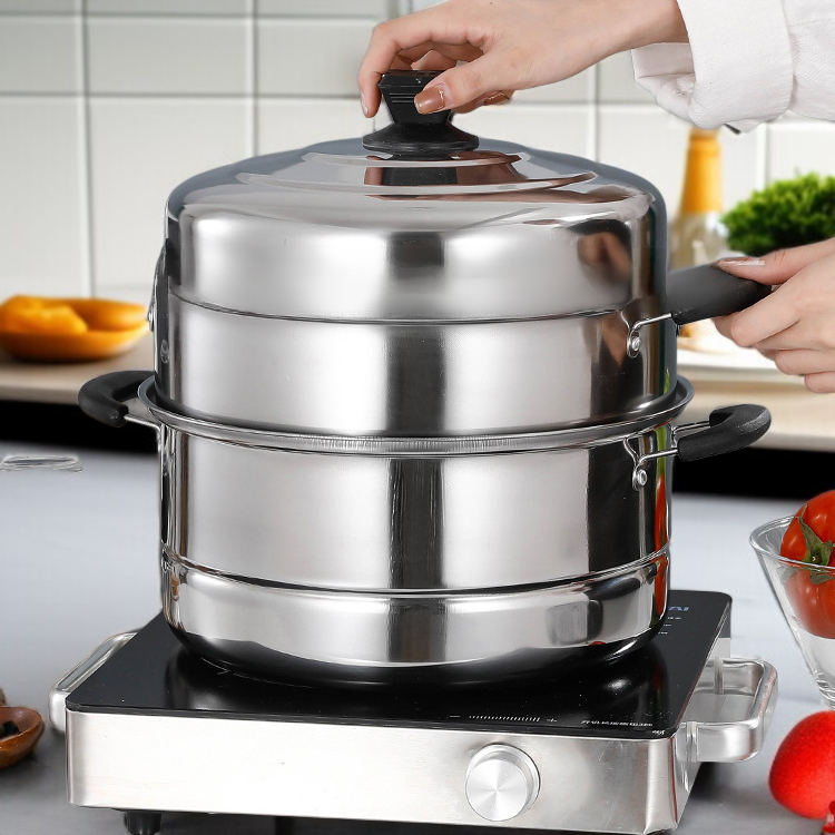 Multi-tier steamer filled with vegetables
