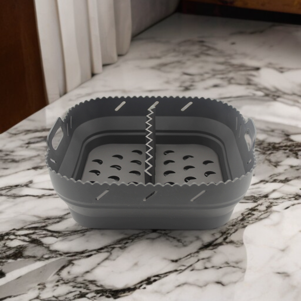 Quadratische Silikonmatte in Heißluftfritteuse eingesetzt