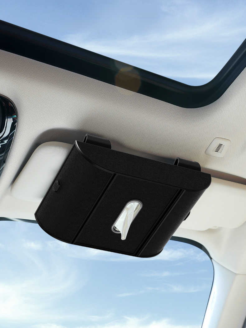 선글라스와 티슈가 함께 보관된 차량용 케이스