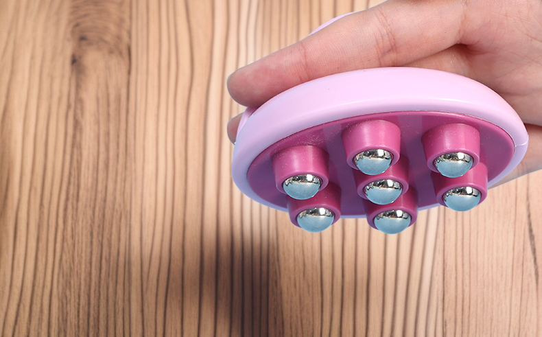 أداة تدليك محمولة وسهلة الاستخدام