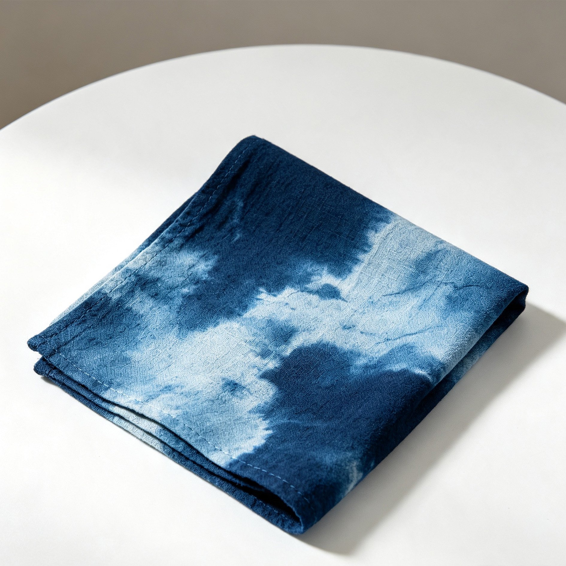 Close-up of indigo dye patterns on cotton and linen tea towel