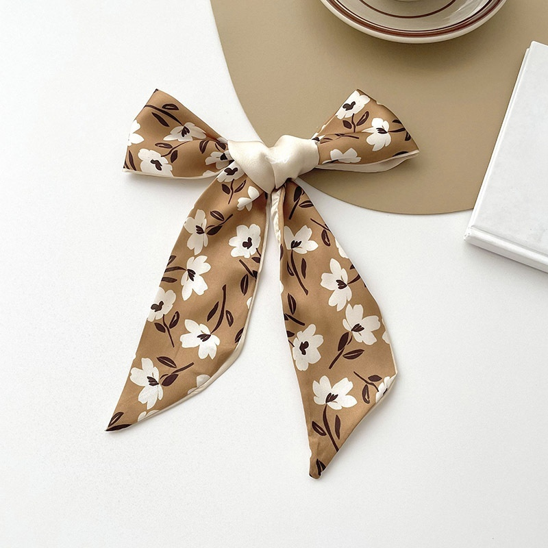 輝くヘッドバンドリボン