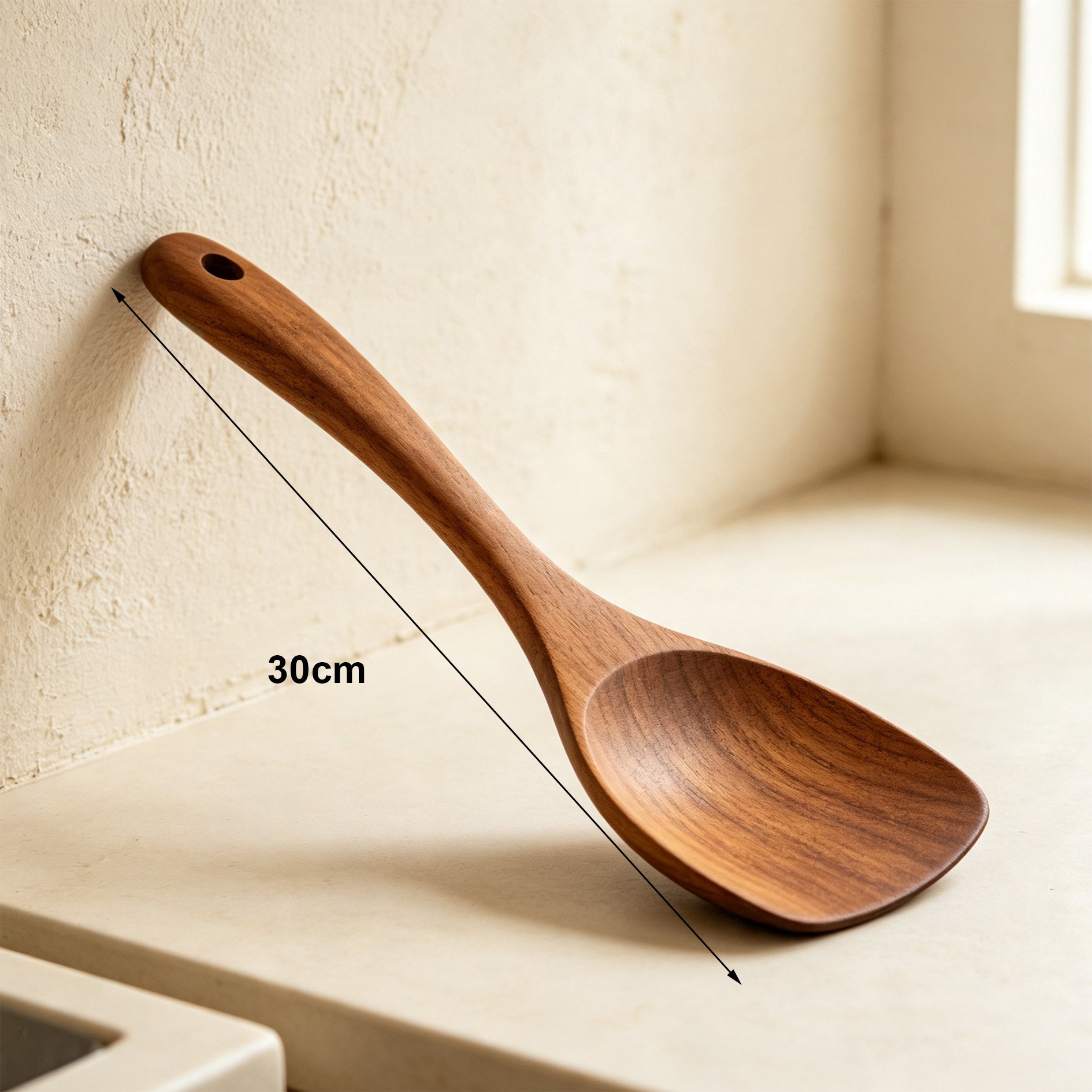 Walnut spatula set displayed with cookware