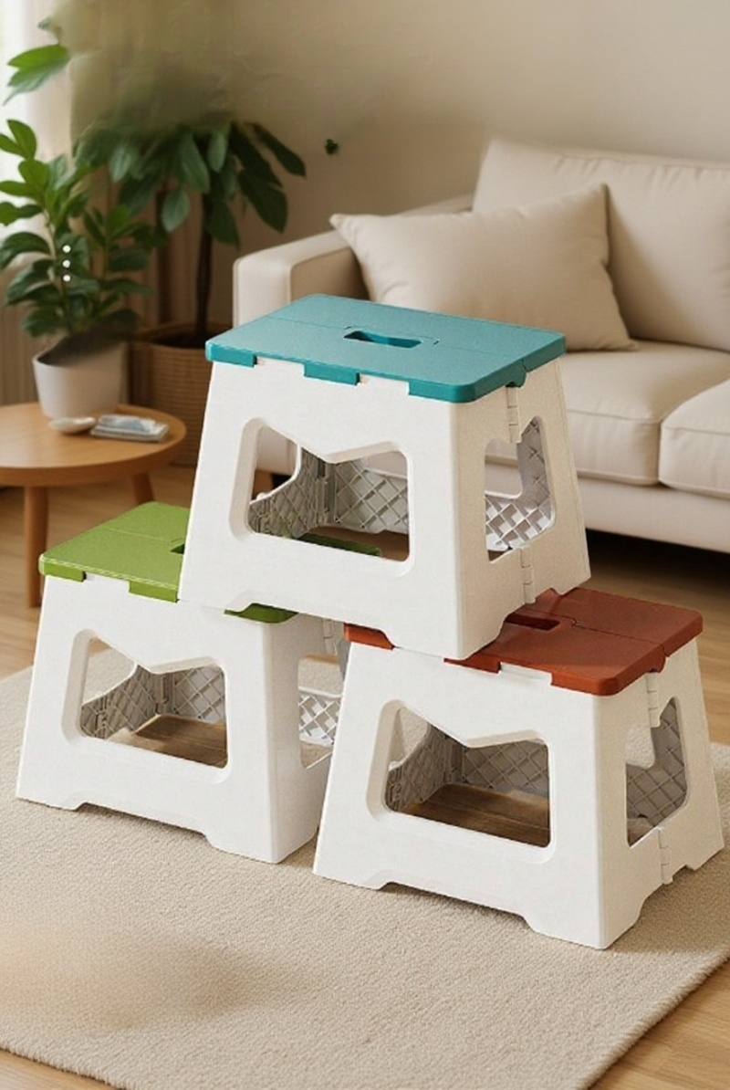 Collapsible stool shown in easy carrying mode