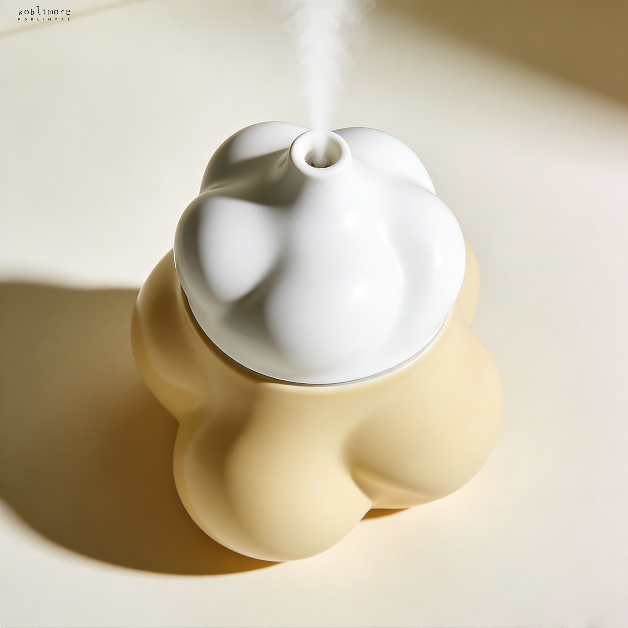 Mini humidifier on a bedside table