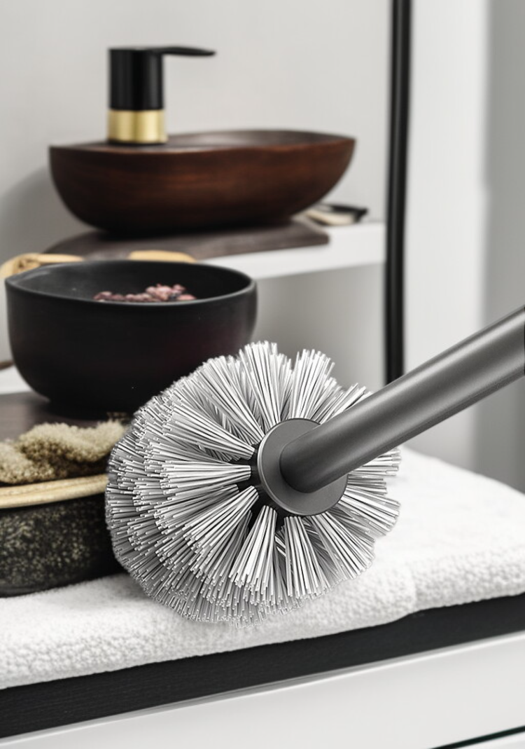 Space saving toilet cleaning brush and holder