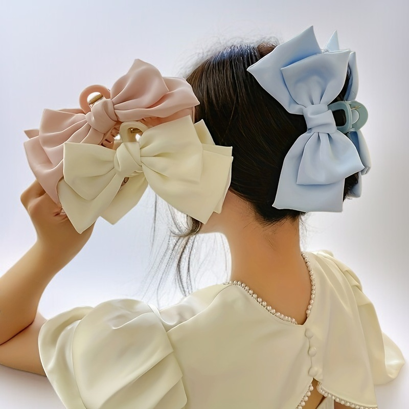 Arc-shaped claw clip