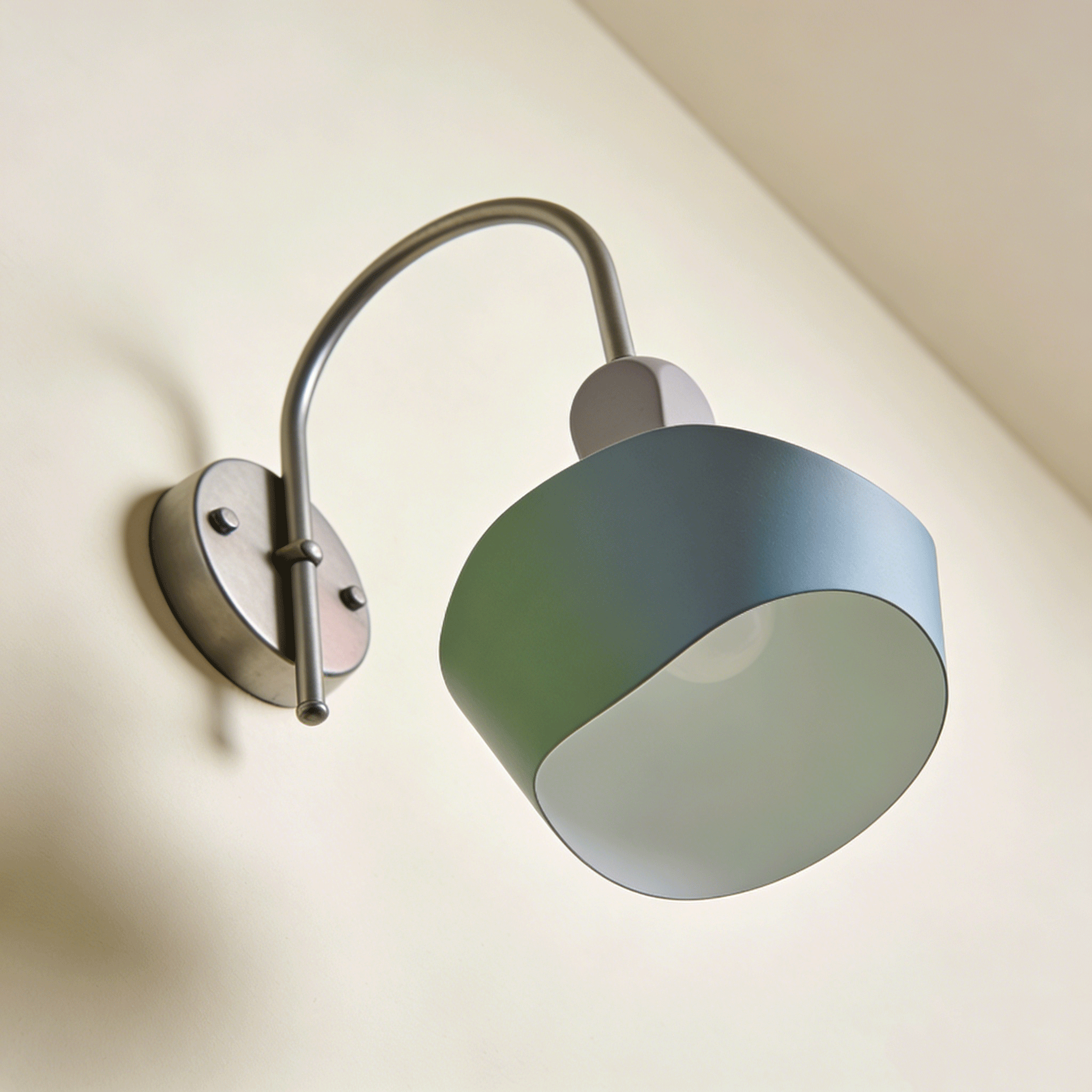 Minimalist modern wall lamp mounted on white wall