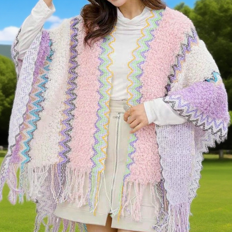 Versatile women's cape styled as a shawl