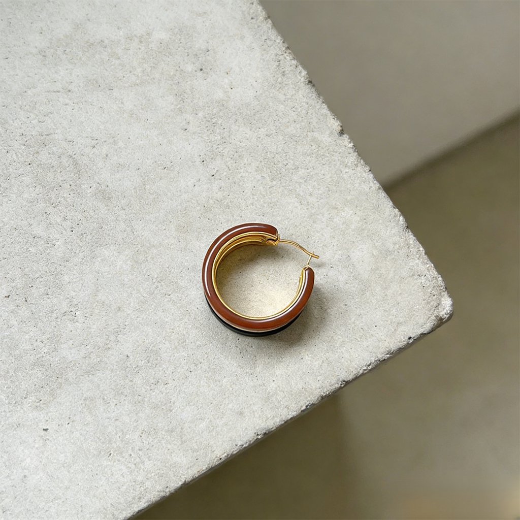 A Pair of Vintage Metal Hoop Earrings