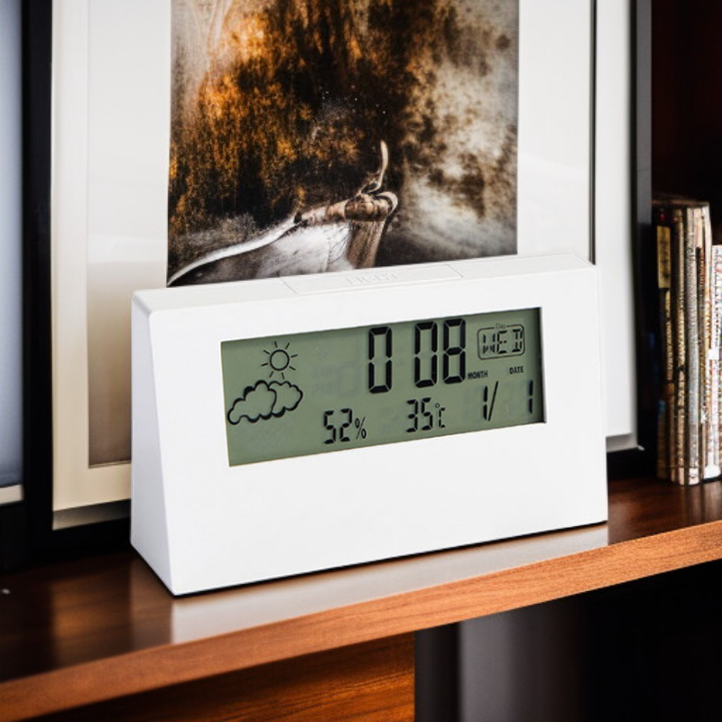 Small bedside clock with luminous screen and timer