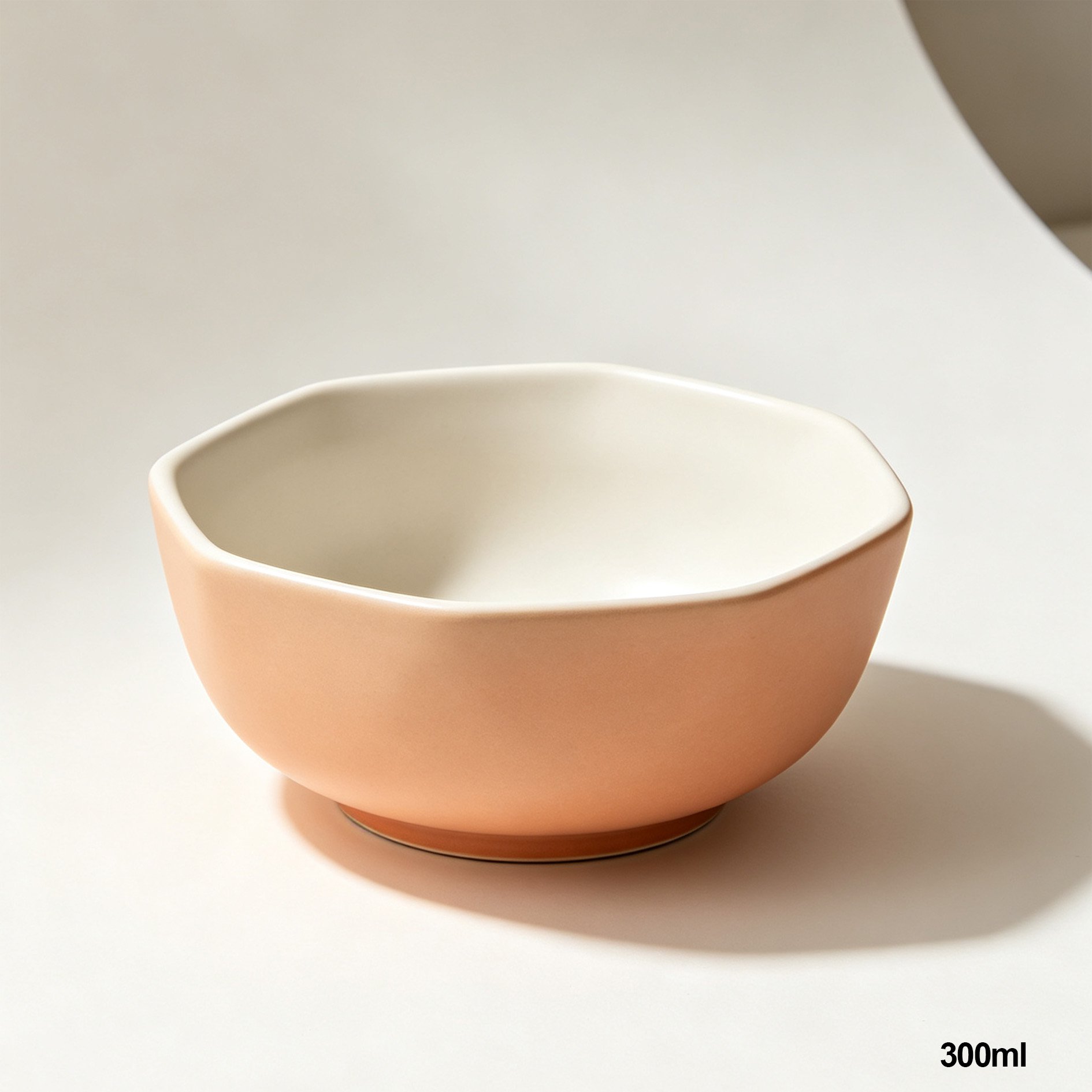 Stacked polygonal ceramic bowls showcasing unique shape