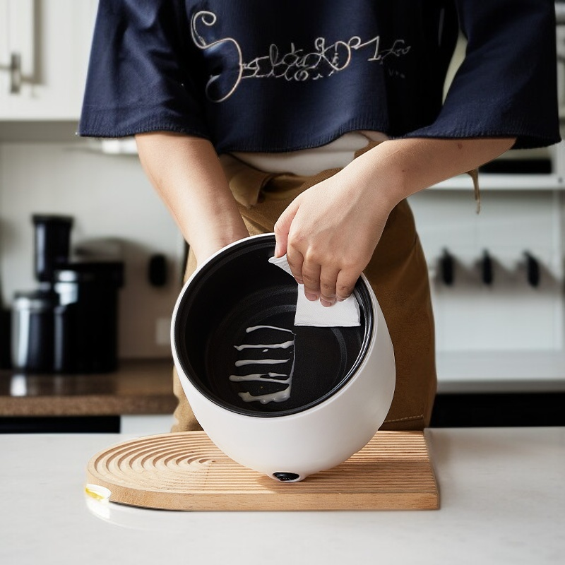 Multifunctional household electric cooker