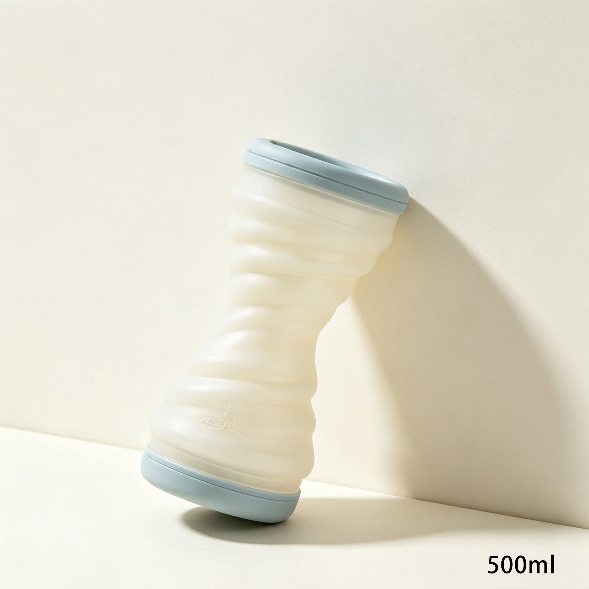 Hand holding a Spiral Pattern Stacking Water Cup