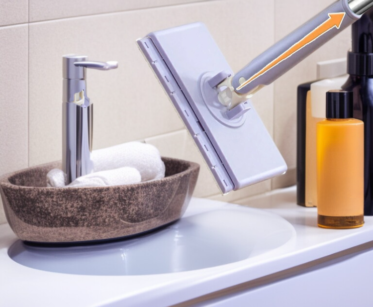 가정용 작은 밀대와 물티슈로 세면대 청소하는 모습